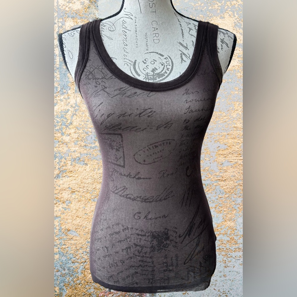 Vintage Jean-Paul Gautier Classique Sheer Tank Top
(M) Brown
Like New/Never Worn